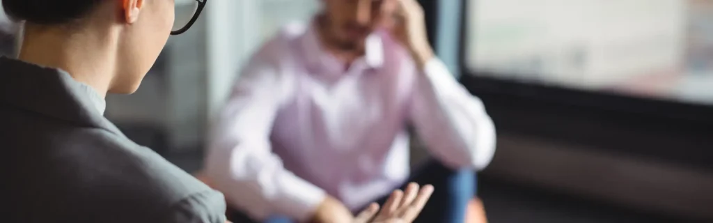 Man talking to another man