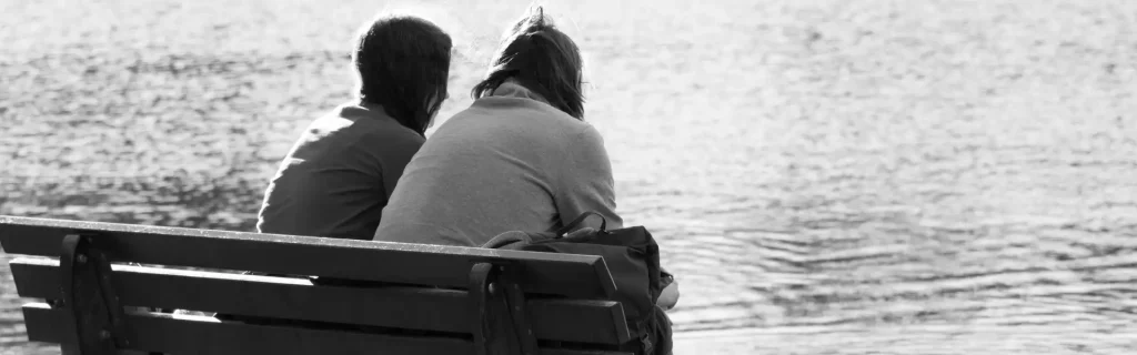 couple sitting on bench