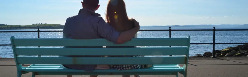 couple sitting on a bench