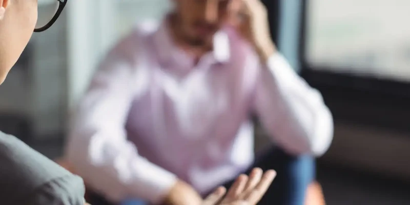 kembali therapy man glasses talking another